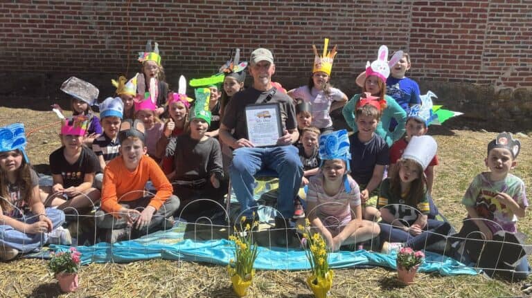 Group picture of students with Mr. Don
