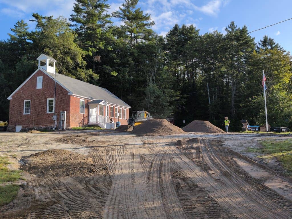 Construction site at Croydon School District with workers and equipment during renovation or expansion.